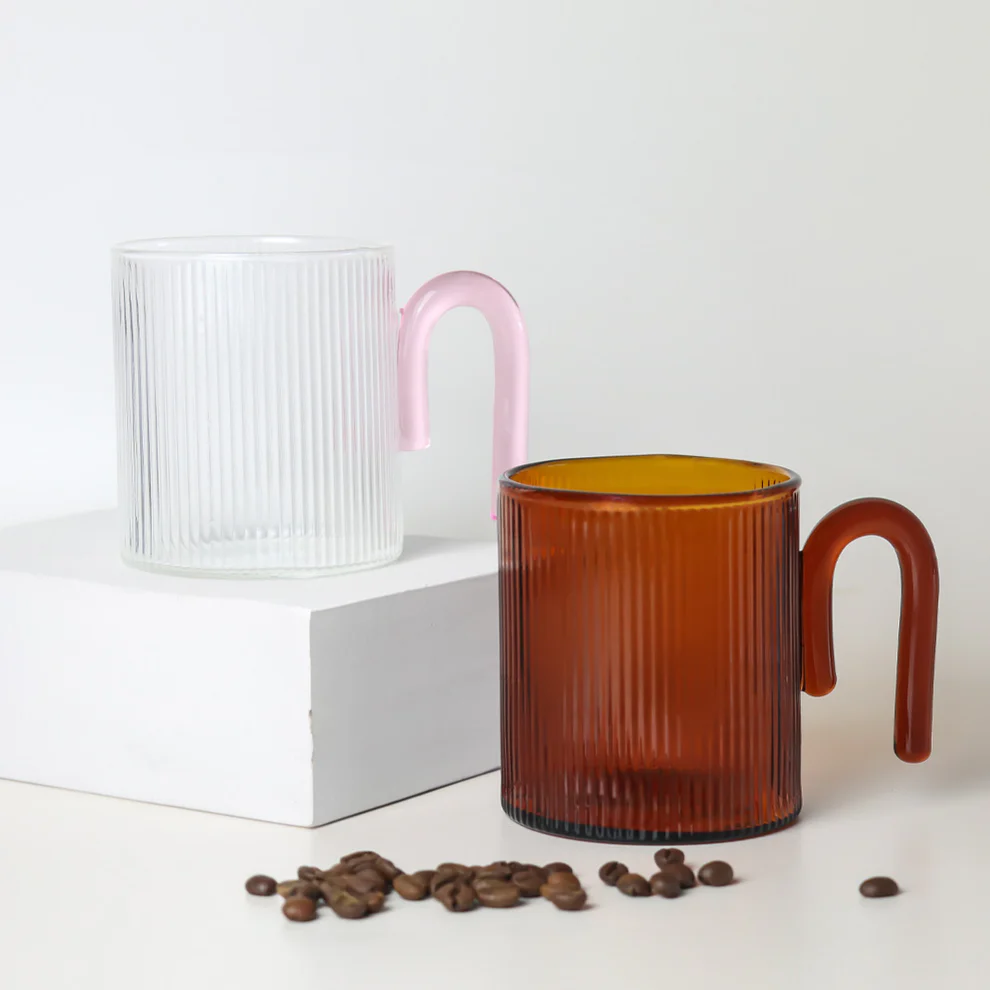 SAGE & COOPER ARCHER RIBBED GLASS CUP - CLEAR/TAFFY PINK 
